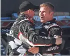  ?? MICHAEL THOMAS SHROYER/USA TODAY ?? Clint Bowyer, right, celebrates with a crew member after winning the STP 500.