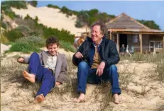  ??  ?? Above: Geoffrey Rush plays the adult Storm Boy, and narrates the story. Below: Behind the scenes with director Shawn Seet (right).