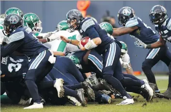  ?? MARK BLINCH/THE CANADIAN PRESS ?? Argonauts QB Cody Fajardo runs for the winning touchdown during last year’s CFL East Division final against the visiting Roughrider­s.