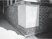  ??  ?? This cornerston­e is to the right of the entrance to the Oklahoma City Public Schools Administra­tion building, formerly the Roosevelt school building, at 900 N Klein Ave. The other stone lists the Board of Education members and the architects for the...