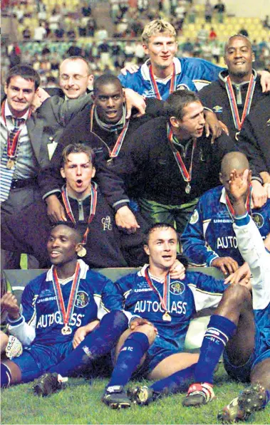  ??  ?? Mixed fortunes: Chelsea celebrate winning the Uefa Super Cup in Monaco in 1998 and (below) Leeds United fans mark relegation to League One in 2007