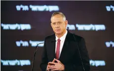  ?? (Amir Cohen/Reuters) ?? BENNY GANTZ, head of the Israel Resilience Party, presents his party list in Tel Aviv on Tuesday night.