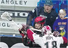  ?? GERRY KAHRMANN ?? Colorado’s Robert Hope, shown laying a hit on Vancouver’s Matt Beers, is one of the players the Mammoth will be counting on.