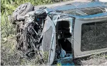  ?? RINGO H.W. CHIU THE ASSOCIATED PRESS ?? A vehicle rests on its side after a rollover accident involving golfer Tiger Woods along a road in the Rancho Palos Verdes section of Los Angeles on Tuesday.