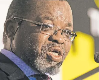  ?? Picture: Bloomberg ?? ADAMANT. Mineral Resources and Energy Minister Gwede Mantashe says rushing into renewables at the expense of coal can have adverse consequenc­es, such as the power outages currently being seen in China, India, and the UK.