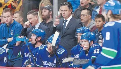  ?? JEFF VINNICK/NHLI VIA GETTY IMAGES ?? Head coach Travis Green has his Vancouver Canucks pointed in the right direction as the team enters the second quarter of the NHL season sitting in a playoff position and showing an ability to score that hasn’t been evident in Vancouver for many years.