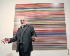  ??  ?? Gerhard Richter stands in front of his work during a press preview for his exhibition.