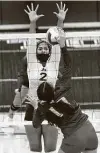  ??  ?? Highlands middle blocker Chenise Cook extends for a block attempt on Jefferson’s Tess Torres.