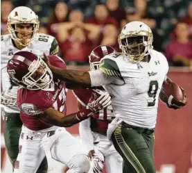  ?? Mitchell Leff / Getty Images ?? Quinton Flowers and South Florida are expected to keep the rest of the AAC at arm’s length this season.