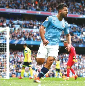  ??  ?? Manchester City’s Sergio Aguero celebrates scoring his side’s third goal