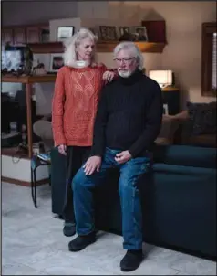  ?? Malcolm / ProPublica)
(Photo by Adria ?? Jeannie Allen (left) and Bill Nevins in their home in Albuquerqu­e.
Jeannie Allen and Bill Nevins regaring their vacation home in the Black Lake area was spared, but their friends’ and neighbors’ homes weren’t.