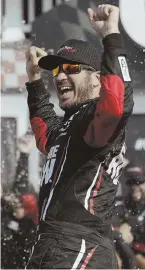  ?? AP PHOTO ?? HE’S THE MAN: Martin Truex Jr. celebrates after winning NASCAR’s I Love New York 355 yesterday in Watkins Glen, N.Y.