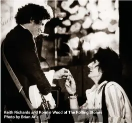  ??  ?? Keith Richards and Ronnie Wood of The Rolling Stones Photo by Brian Aris