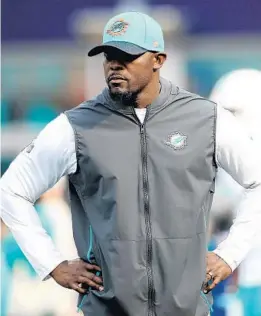  ?? ADAM GLANZMAN/GETTY IMAGES ?? Dolphins head coach Brian Flores is looking to avoid a repeat of last year’s 56-26 loss to the Bills in their home opener Sunday.