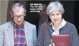  ??  ?? ON BREAK The PM with hubby Philip yesterday