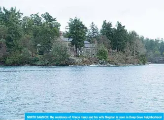  ??  ?? NORTH SAANICH: The residence of Prince Harry and his wife Meghan is seen in Deep Cove Neighborho­od from a boat on the Saanich Inlet, North Saanich, British Columbia. —AFP