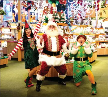  ?? COURTESY STAGECRAFT­ERS ?? Performers in “Elf the Musical” include Cassie Najor as Jovie, left, Toby Booker as Santa, and Geoff Wrobel as Buddy the elf.