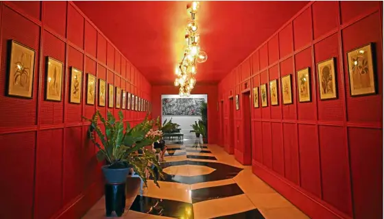  ??  ?? The Wong Kar Wai-esque corridor at Manila House welcomes guests.