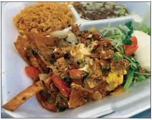  ?? (Arkansas Democrat-Gazette/Eric E. Harrison) ?? Cotija’s still serves chilaquile­s (left) and cheese enchiladas (right) in its new downtown Little Rock home in the Union Plaza building.