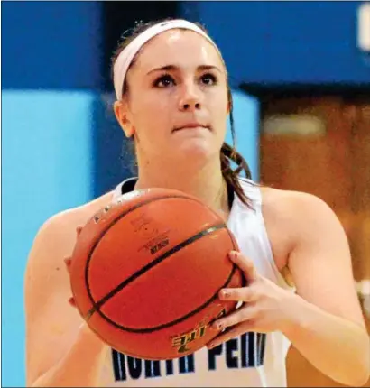  ?? MARK C. PSORAS/THE REPORTER ?? NORTH PENN
senior Vicky Tumasz has had a postseason to remember, which included scoring her 1,000th point.