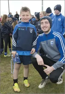  ??  ?? Best Academy Boy Brogin O’Driscoll is presented with his award by by Sean Mescall.