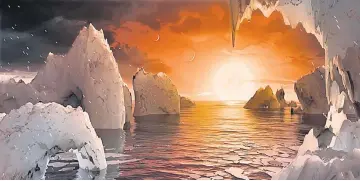  ??  ?? An artist’s depiction shows the possible surface of TRAPPIST-1f, on one of seven newly discovered planets in the TRAPPIST-1 system that scientists using the Spitzer Space Telescope and ground based telescopes have discovered according to Nasa, in this...