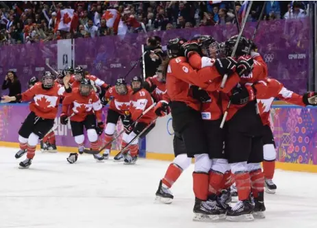  ?? JUNG YEON-JE/AFP/GETTY IMAGES ?? Canada will have a number of athletes defending gold medals in South Korea, including the women’s hockey team and moguls specialist Justine Dufour-Lapointe, who shared the Sochi podium with sister and silver medallist Chloe Dufour-Lapointe, bottom...