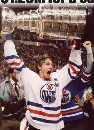  ?? File photo /The Columbus Dispatch ?? Edmonton Oilers hockey great Wayne Gretzky screams with joy as he hoists the Stanley Cup over his head following the team’s win over the New York Islanders in Edmonton, in this May 19, 1984 photo.