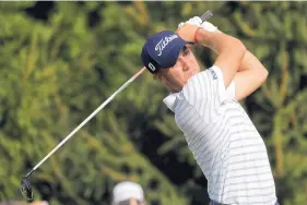  ?? AP FILE ?? Justin Thomas finished the PGA season with $8,694,821 in earnings, which made him the first player since Tiger Woods in 2006 and 2007 to win consecutiv­e money titles.