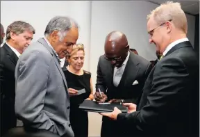  ??  ?? Finance Minister Malusi Gigaba with, from left, Firstrand chief executive Johann Burger; Banking Associatio­n of SA managing director Cas Coovadia;absa chief executive Maria Ramos; and Nedbank chief executive Mike Brown in Johannesbu­rg.