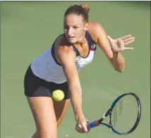  ?? The Associated Press ?? Karolina Pliskova, of the Czech Republic, returns to Caroline Wozniacki, of Denmark, at the Western & Southern Open on Friday in Mason, Ohio.