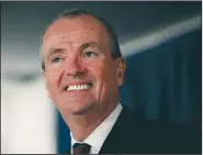  ?? AP File Photo ?? New Jersey Gov. Phil Murphy, shown Jan. 16, is joining the governors of New York and Connecticu­t in forming a multistate coalition to sue President Donald Trump’s administra­tion over the 2017 tax bill.