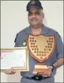  ??  ?? Warrant Officer Hemant Raghoonund­an received a certificat­e of bravery from a church in Shallcross.