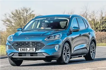  ??  ?? MILE MUNCHER: The third generation Ford Kuga is a fantastic all-round family car.