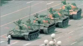  ?? AP/FILE ?? In this iconic June 5, 1989 photo, a man is seen standing in front of tanks at Tiananmen Square.