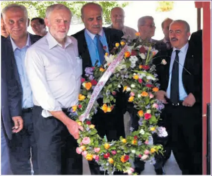  ??  ?? NOT INVOLVED? Jeremy Corbyn attends that controvers­ial wreath-laying ceremony in Tunisia