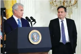  ?? AP PHOTO/SUSAN WALSH ?? Incoming Chief of Staff Jeff Zients, left, speaks Feb. 1 as outgoing White House Chief of Staff Ron Klain listens in the East Room of the White House in Washington.