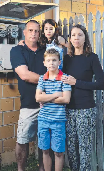  ?? Picture: WESLEY MONTS ?? TURNED OFF: Allan Pilcher, his wife Sue and children Jasper, 9, and Sienna, 7, are feeling the effects of rising electricit­y prices.