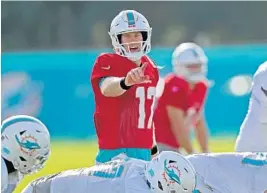  ?? JOHN MCCALL/STAFF PHOTOGRAPH­ER ?? Ryan Tannehill calls out a play during camp on Monday. The quarterbac­k turned 30 on Friday.