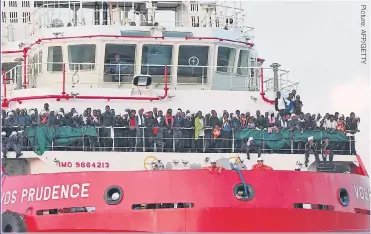  ??  ?? FERRIED OVER: A rescue ship carrying about 1,000 migrants reaches Salerno, Italy