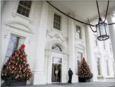  ?? ANDREW HARNIK — THE ASSOCIATED PRESS ?? The North Portico of the White House is decorated during a preview of the 2016 holiday decor, Tuesday in Washington.