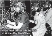  ?? ?? A gas mask drill for telephonis­ts at Whitley Bay Post Office