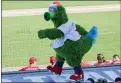  ?? YONG KIM — THE PHILADELPH­IA INQUIRER VIA AP, FILE ?? Mascots, like the Phillie Phantaic, are getting a reprieve from Major League Baseball. A month after being tossed out because of health concerns, they’re again poised to become inside-the-parkers.