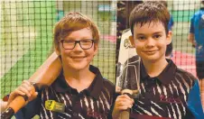  ??  ?? Townsville under-10 developmen­t players Kailem Lee, 9, and Noah Boon, 9.