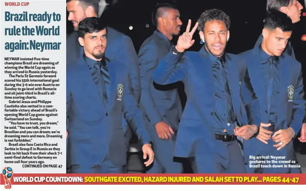  ??  ?? Big arrival: Neymar gestures to the crowd as Brazil touch down in Russia