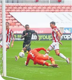  ??  ?? Stoke City’s Lee Gregory scores the only goal of the game