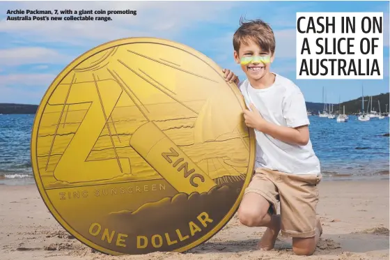  ??  ?? Archie Packman, 7, with a giant coin promoting Australia Post’s new collectabl­e range.