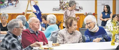  ?? KATHY JOHNSON PHOTO ?? People socialize at the Clark’s Harbour New Year’s Day levee at Branch #148 of the Royal Canadian Legion.