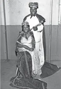  ?? THE COMMERCIAL APPEAL FILES ?? Robed and crowned, the junior king and queen of Cotton Maker’s Jubilee were chosen in April 1953 at the Beale Auditorium. Queen Janie Etta Albrook, 12, of 388 Pontotoc, a pupil at Leath, and King Robert Hines Jr., 12, of 484 Williams, a pupil at St....