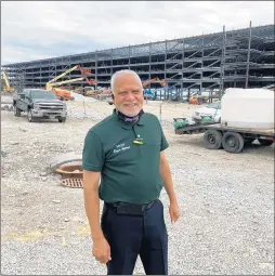  ?? TED SLOWIK/DAILY SOUTHTOWN ?? Economic developmen­t was a big story in the south suburbs in 2020. During the summer, Markham Mayor Roger Agpawa visited the site where an Amazon fulfillmen­t center is being built south of 159th Street between Dixie Highway and Interstate-294.